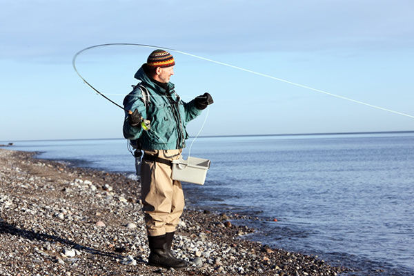 Lystfisker på stranden