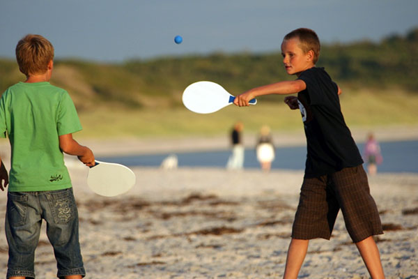 Leg på stranden