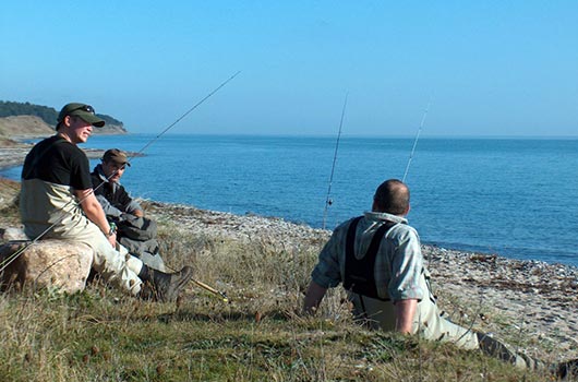 Lystfiskere på stranden