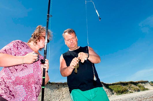 Lystfiskere på stranden