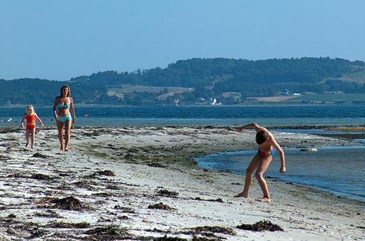 Leg på stranden