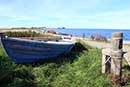 Træbåd på stranden