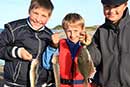 Lystfiskere med fangst
