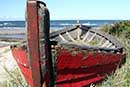 Gammel træbåd på stranden