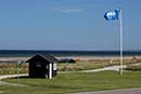 Blåt flag ved stranden